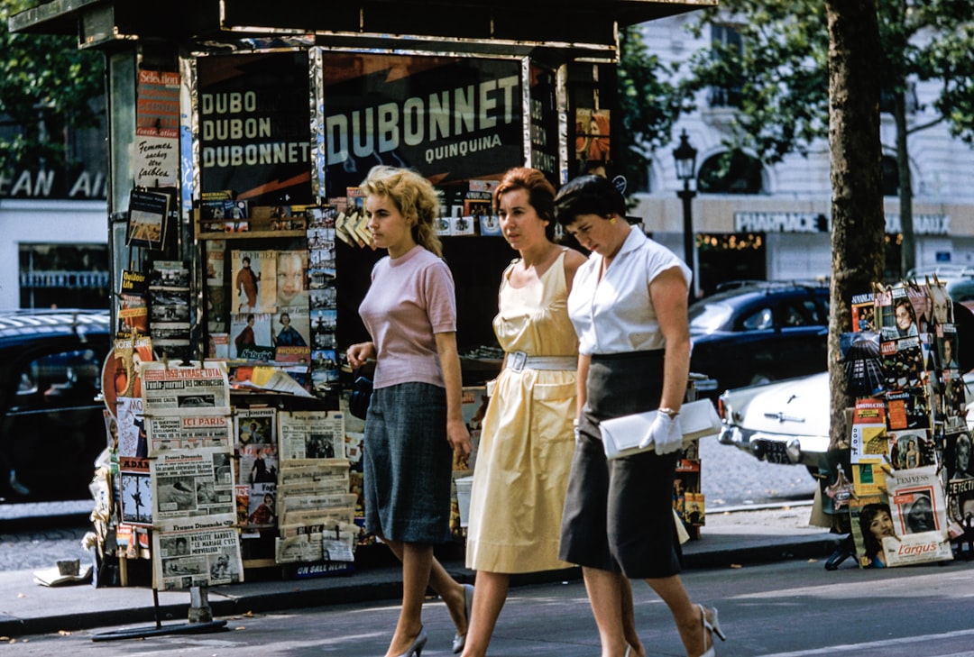 three women walking on road, Three retro women