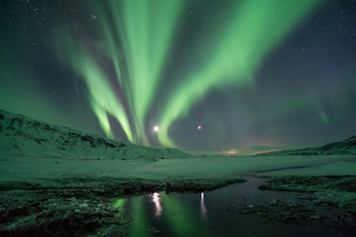 photography of aurora borealis ethereal teams background