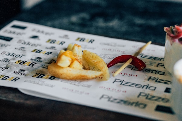 French fries and a hot chili pepper at an indian restaurant