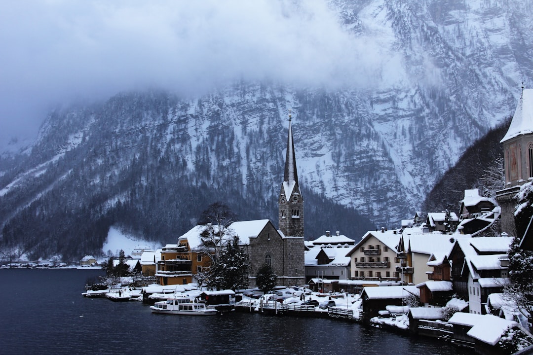 village near body of water and moutain, Winter town