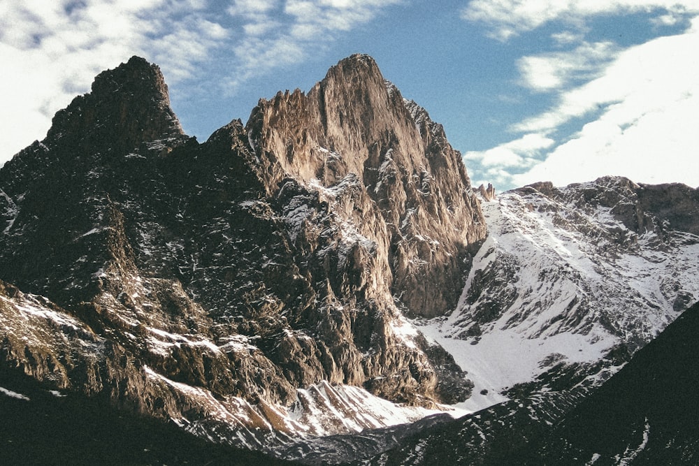 snow covered brown and gray mountain