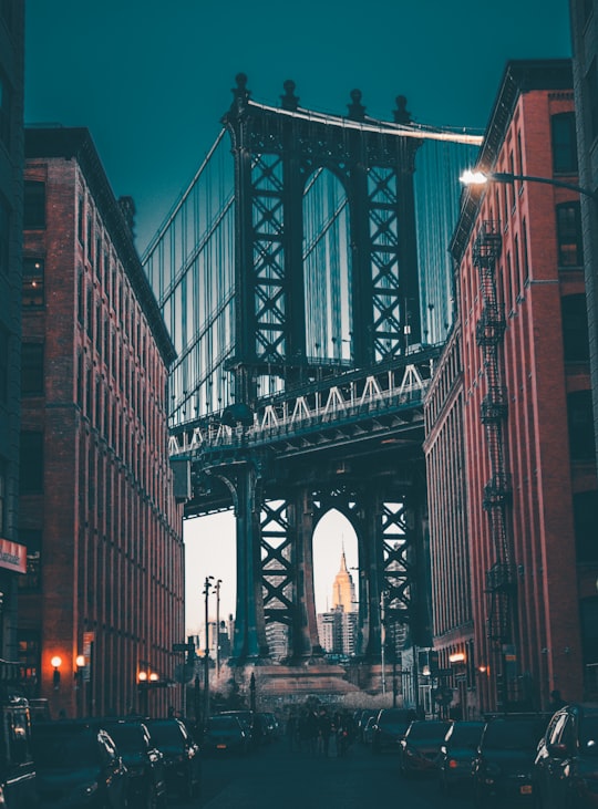 Manhattan Bridge during nighttime in Brooklyn Bridge Park United States