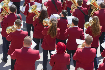 A group of trumpet players of all ages performing together outdoors in Bremerton, Washington