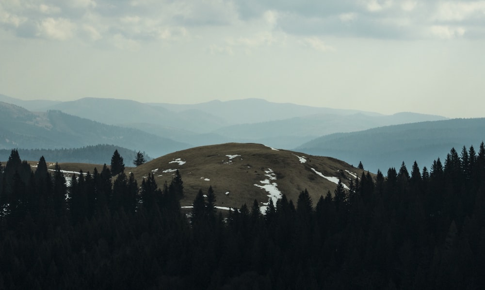 landscape photo of brown mountain