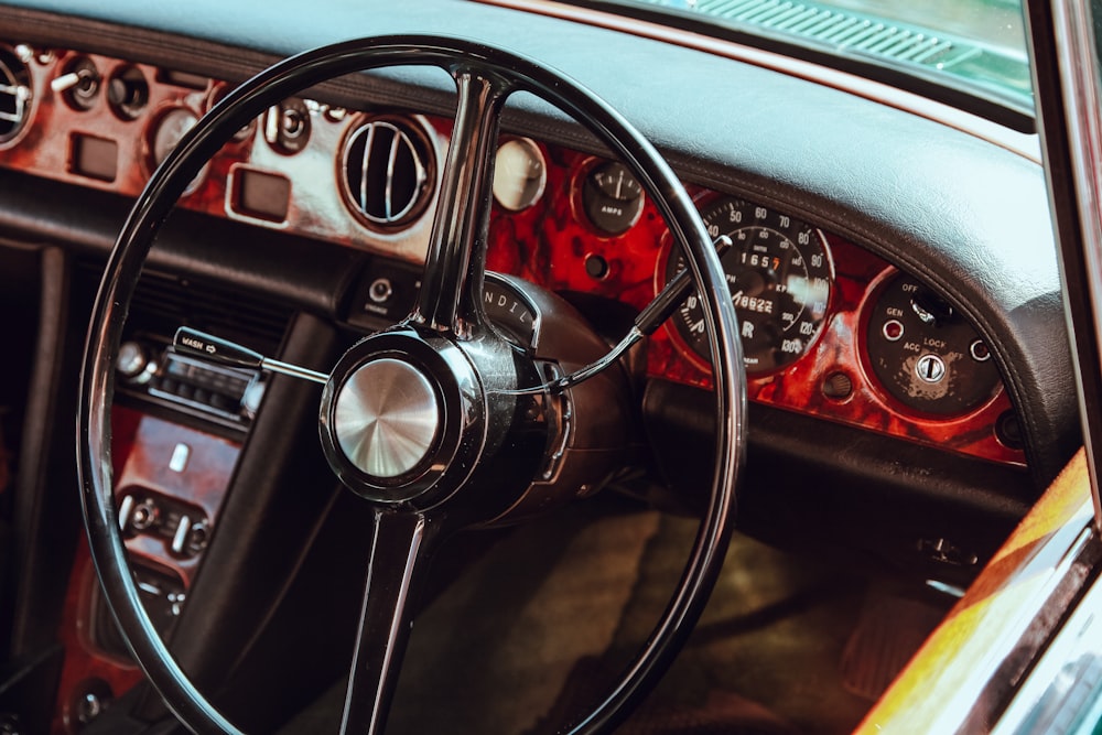 black and gray car steering wheel