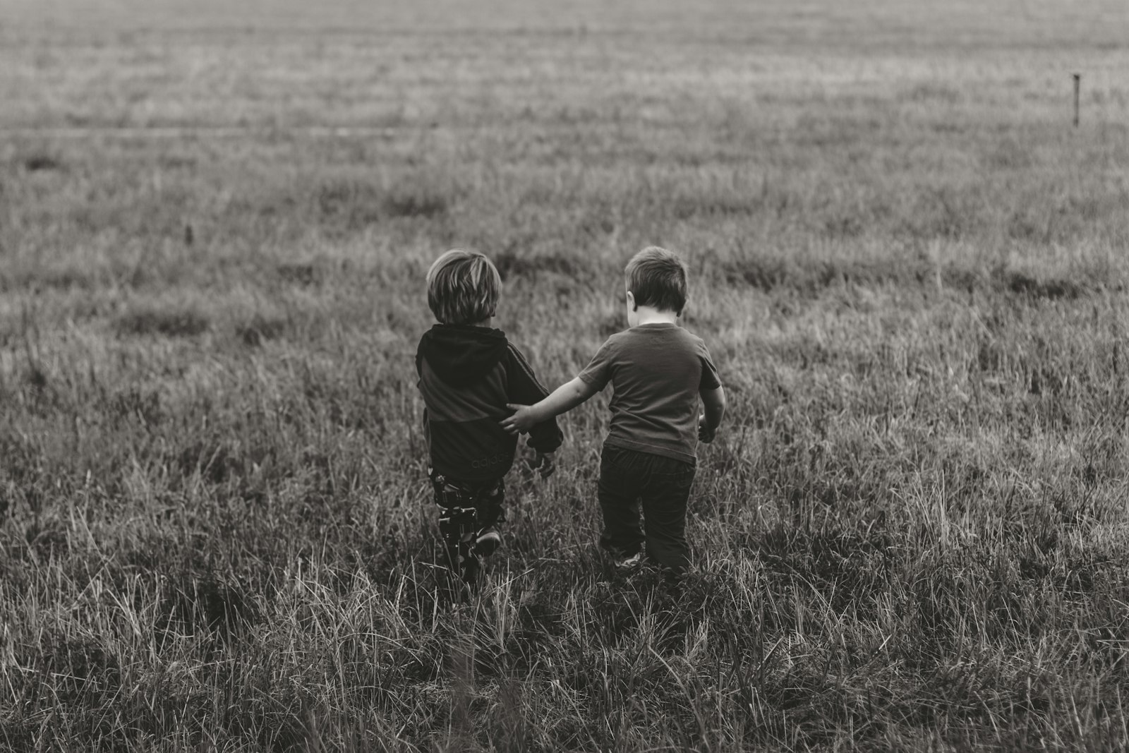 Canon EOS 7D + Canon EF 50mm F1.4 USM sample photo. Two boy's walking on photography