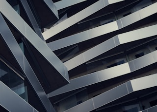 low angle photography of gray building at daytime