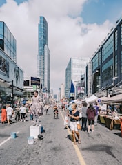 A bustling street filled with festival-goers.