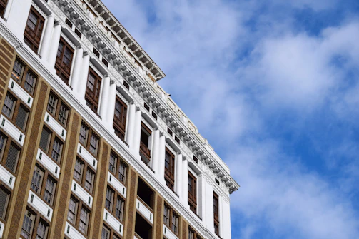 Exterior shot of Vaibhavlakshmi building against a clear blue sky.