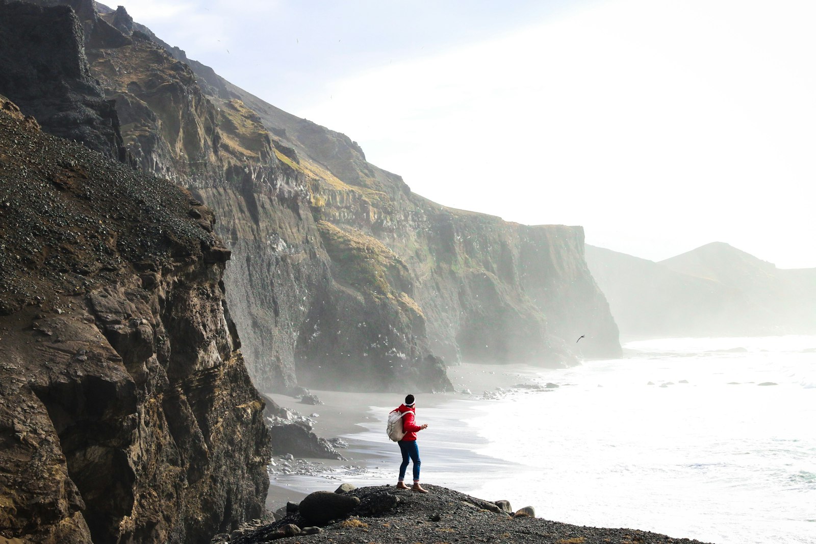 Canon EOS 70D + Canon EF 40mm F2.8 STM sample photo. Person standing on cliff photography