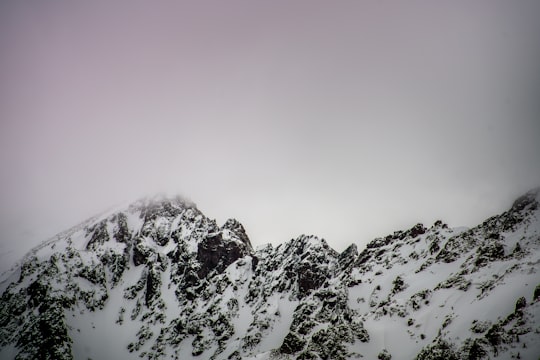 snow covered mountain under gray cloudy sky in Red Mountain United States