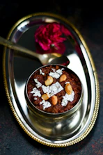 Elegant plating of a fusion dessert combining classic Indian sweets with contemporary flair.