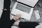 silver MacBook Pro