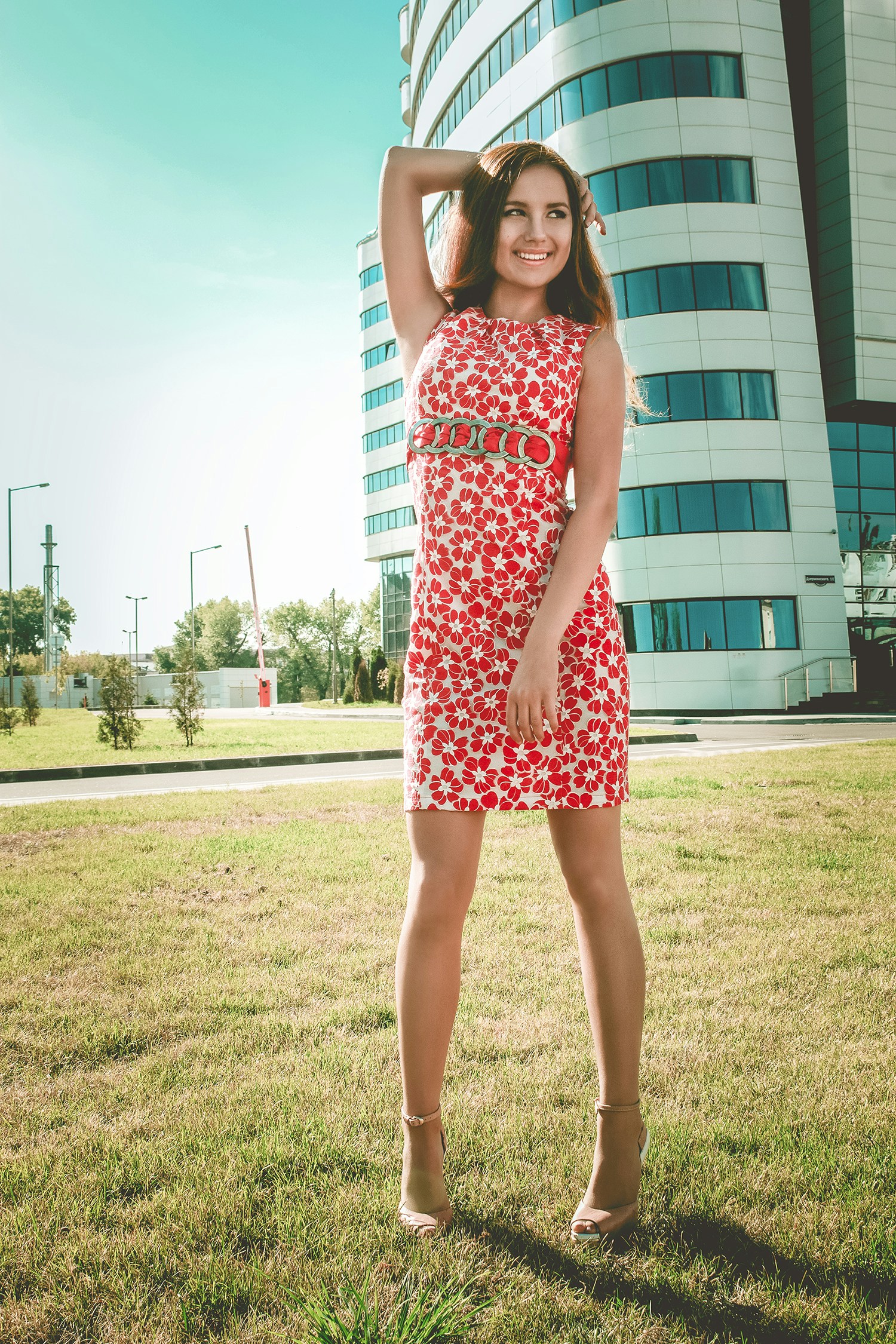 Woman in floral dress, bright natural light