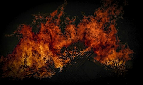 The highlight event where controlled fire spreads across the hillside