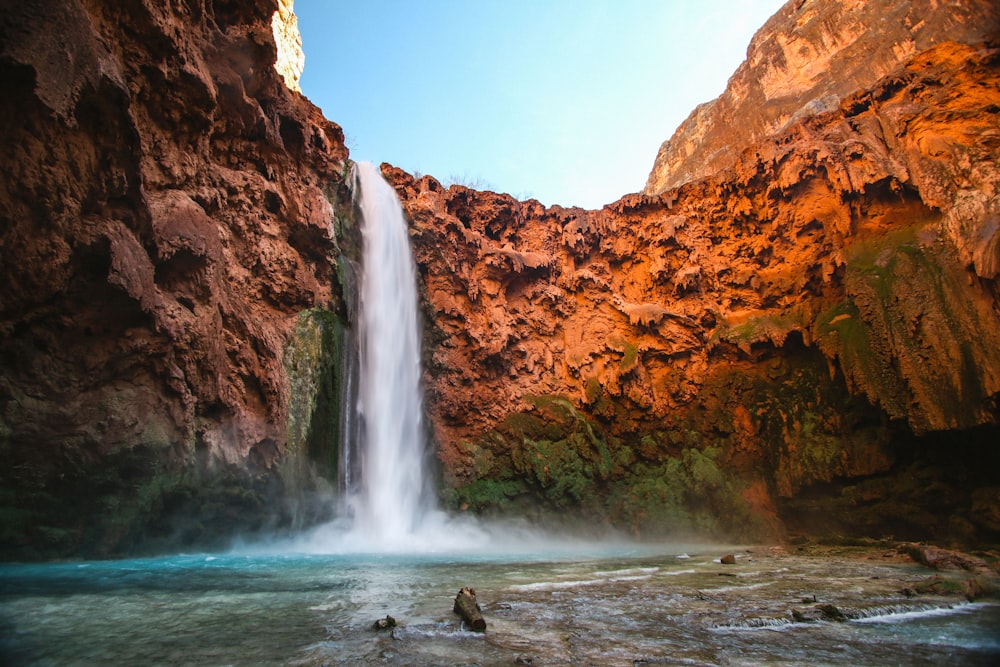 time lapse photography of waterfalls