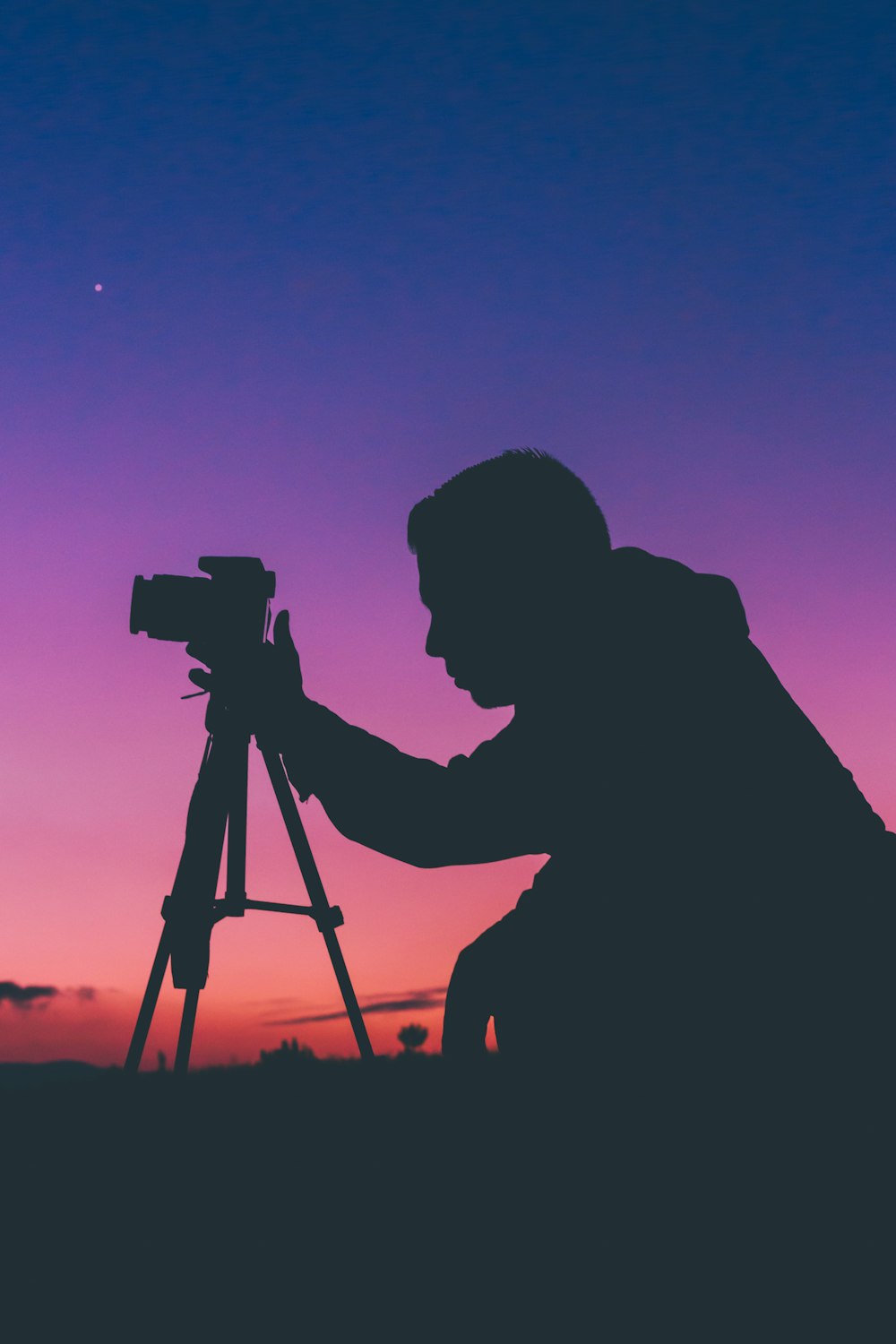 silhouette photography of man talking photo