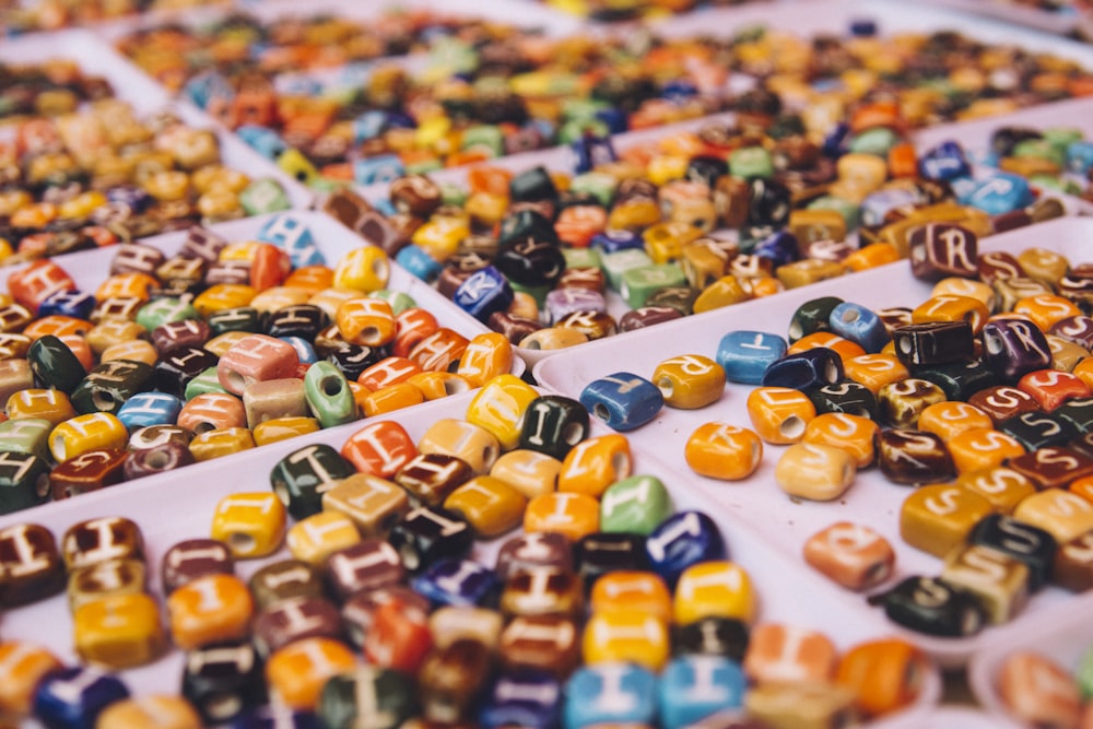 assorted-color bead lot on white tray