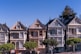 five 3-storey houses in-lined on street