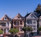 five 3-storey houses in-lined on street