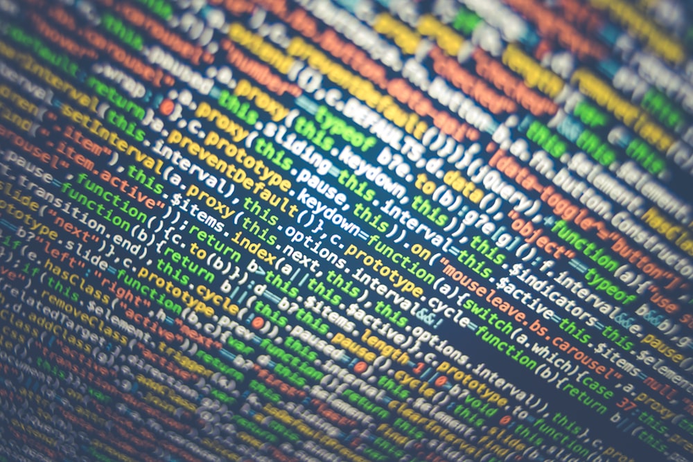 Close-up of colorful lines of code on a computer screen