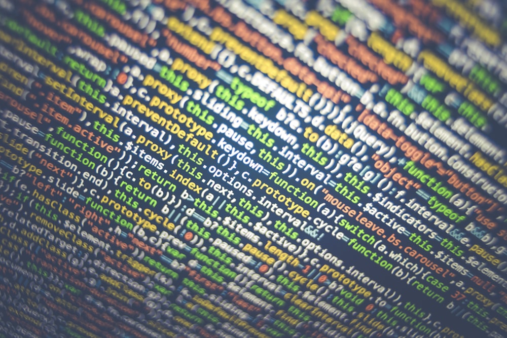 Close-up of colorful lines of code on a computer screen