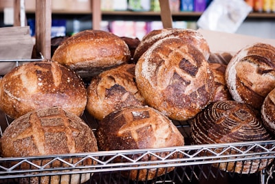 Shelves displaying packaged breads ready for shipment, highlighting quality.