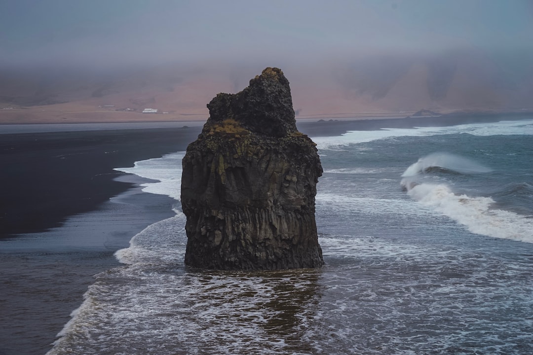 rock formation on body of water, Crater in iceland