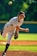 baseball pitcher throwing some fast ball pitch