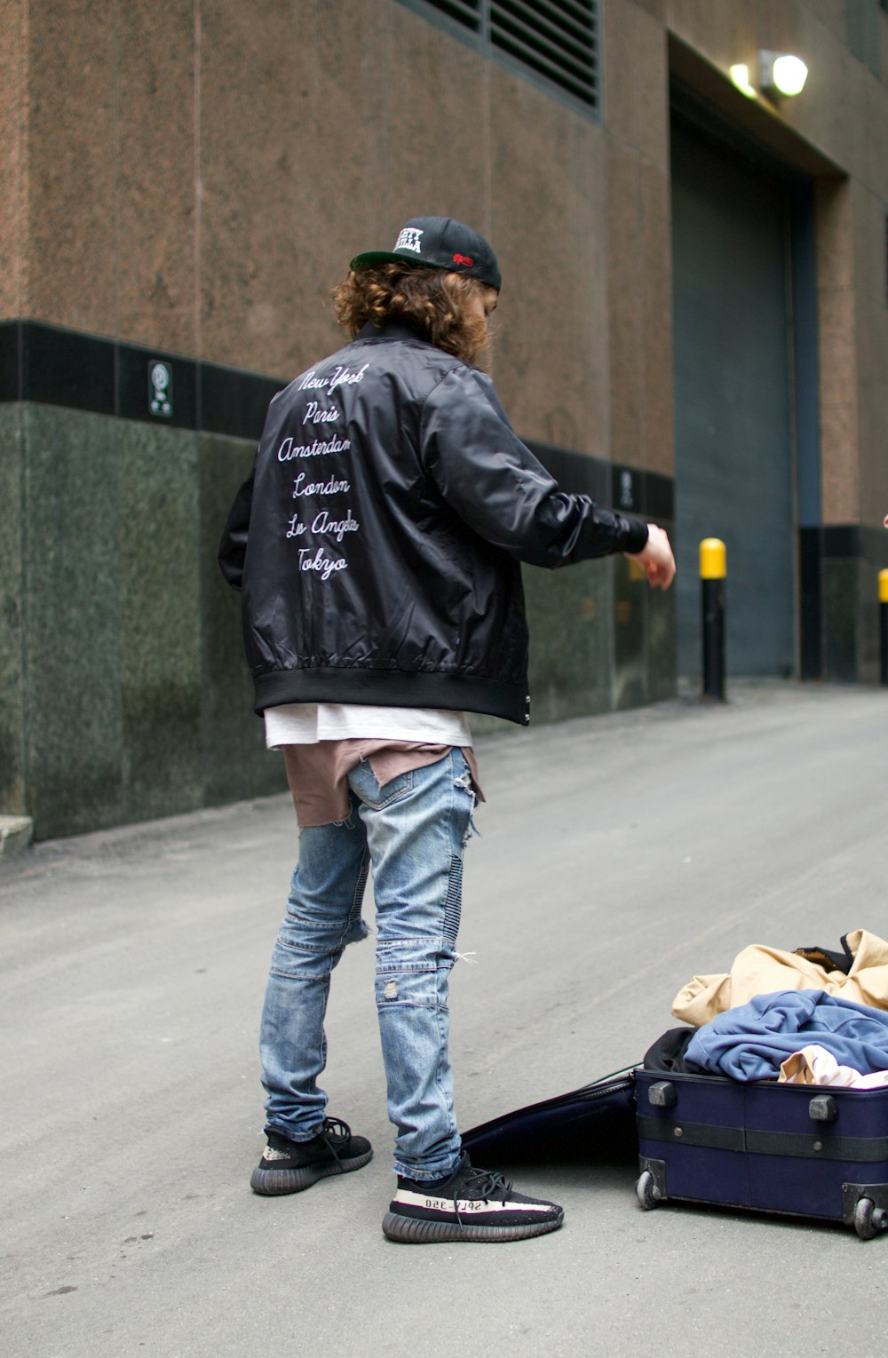 man in black and white jacket