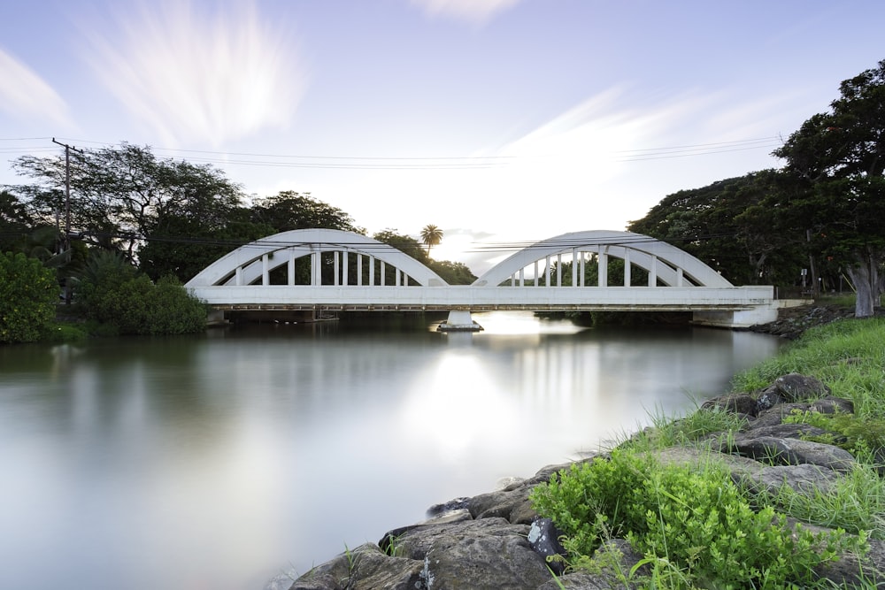 white and green bridge over river