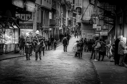 people walking along road in Metropolitan City of Florence Italy