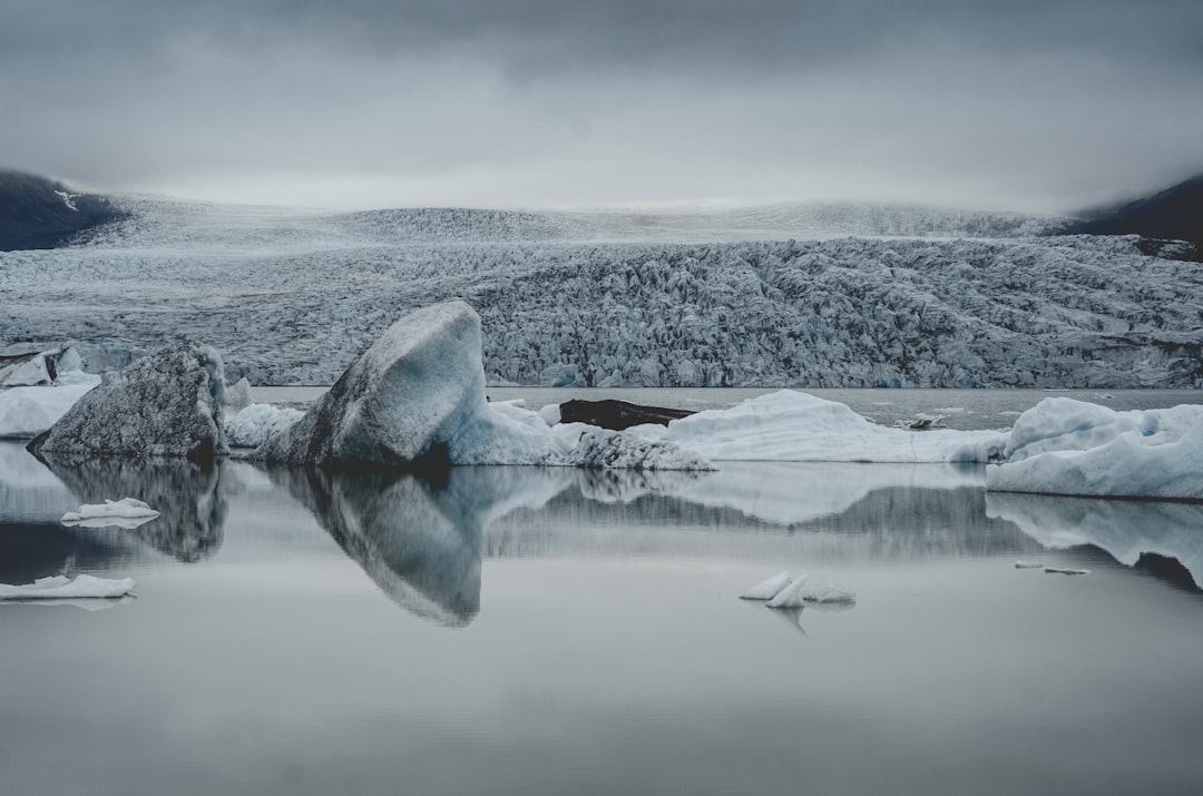 ice berg on body of water