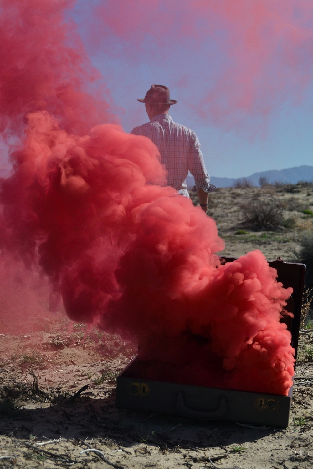 Red smoke in the desert.