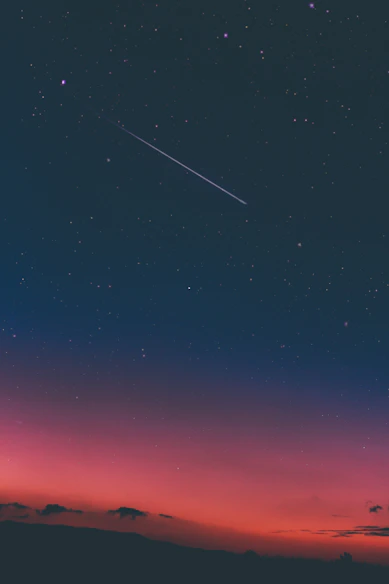 shooting star in night sky