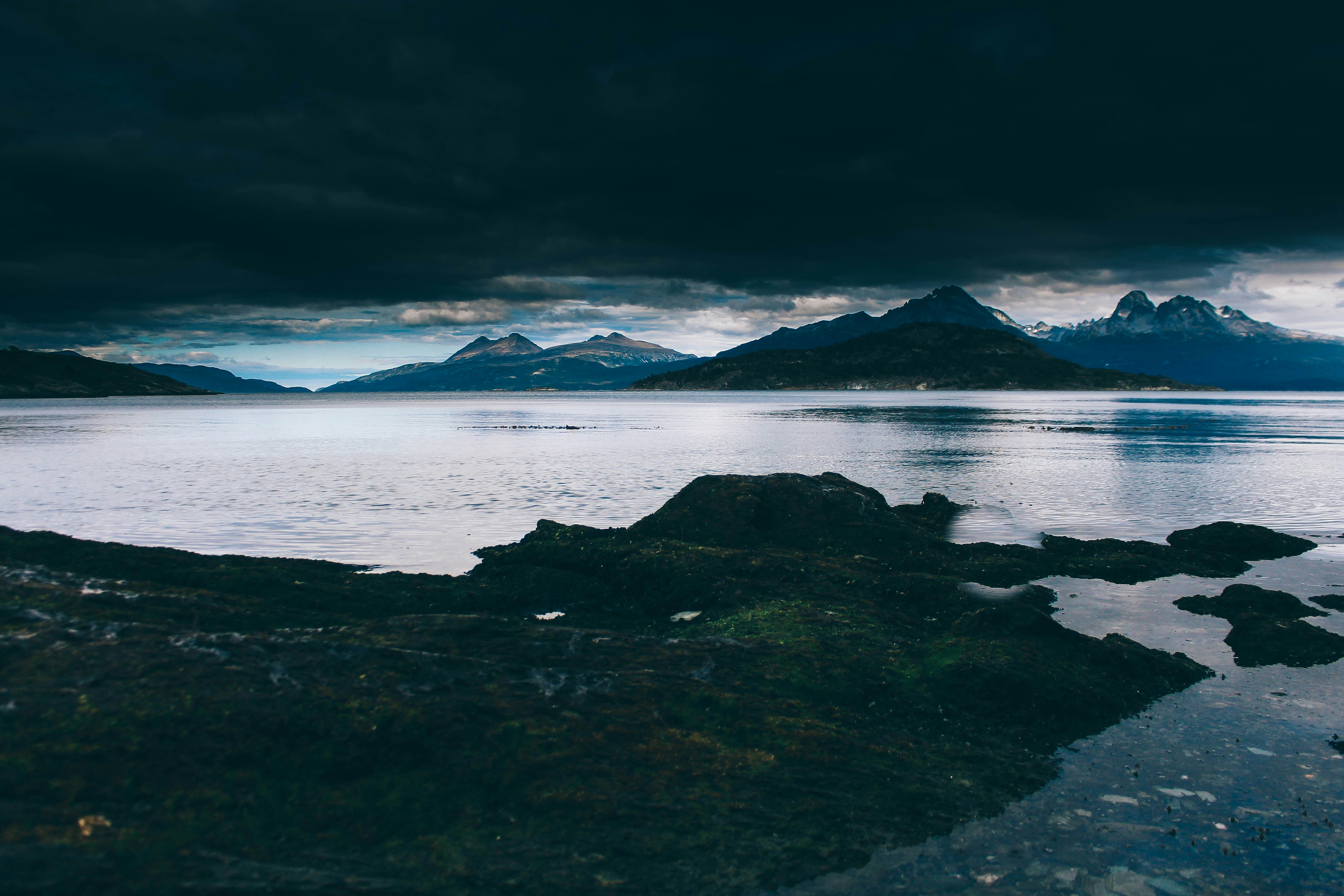 landscape photography of mountain and body of water