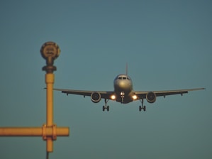 flying gray airplane