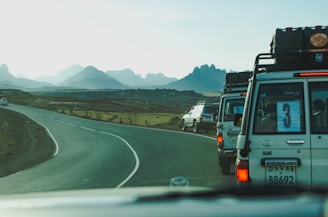 vehicles travelling on road during daytime