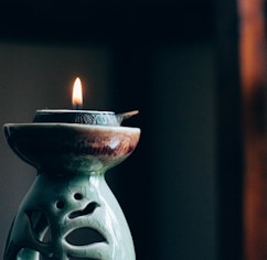 rule of thirds photography of lit candle