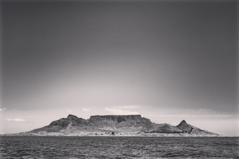 grayscale photo of snow covered mountain