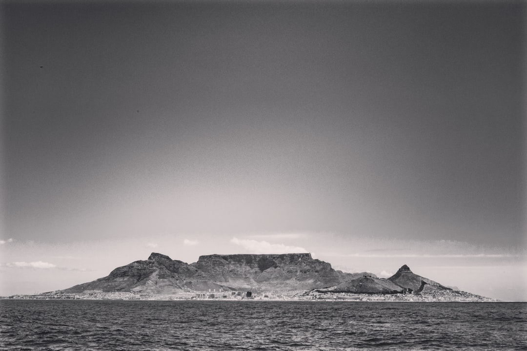 grayscale photo of snow covered mountain