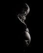 pregnant woman holding tummy