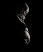 pregnant woman holding tummy