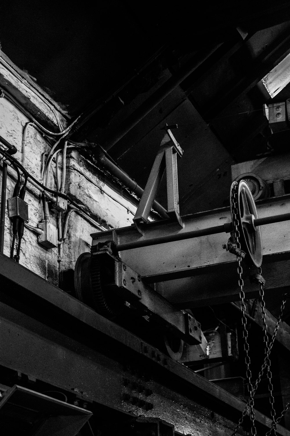 a black and white photo of a crane