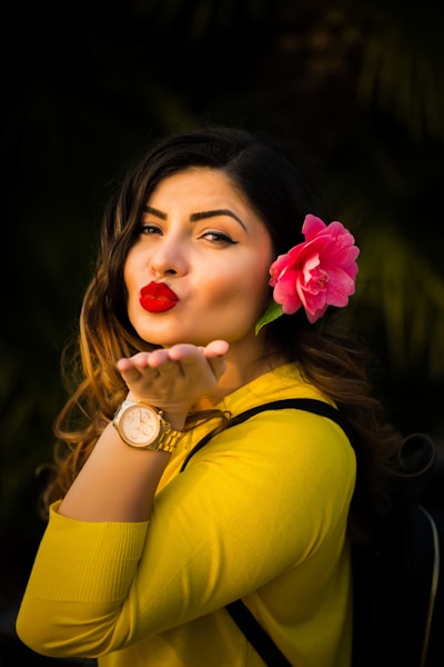 woman wearing yellow elbow-sleeved shirt