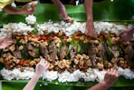 photo of people eating rice