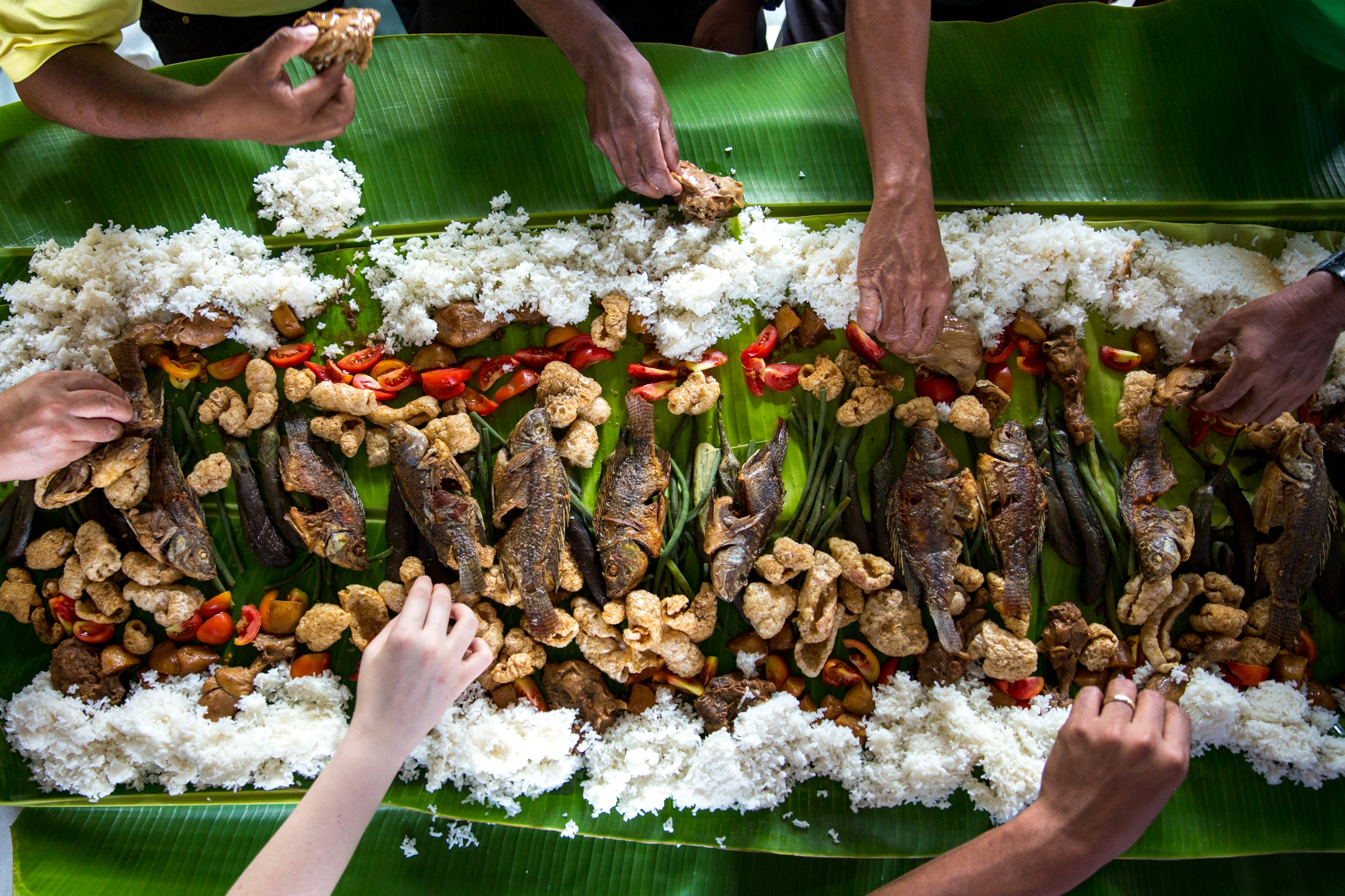Exotic food laying on a banana leaf