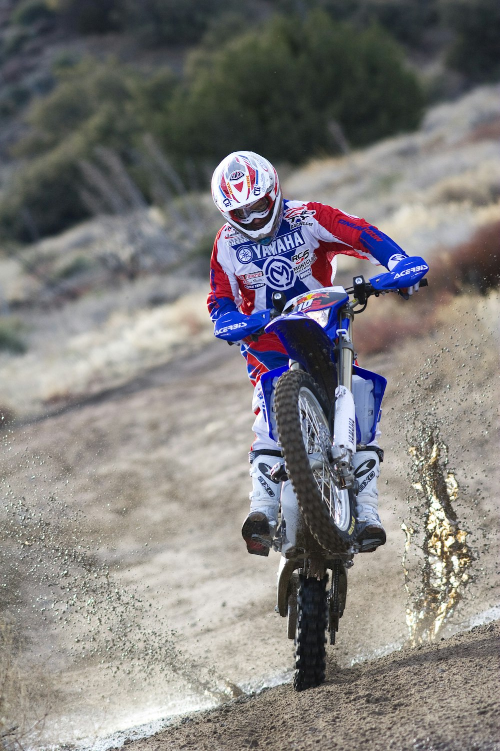 man riding of dirt bike