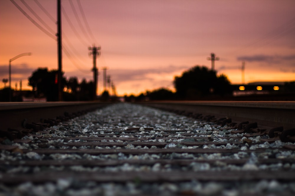 shallow focus photography of train track