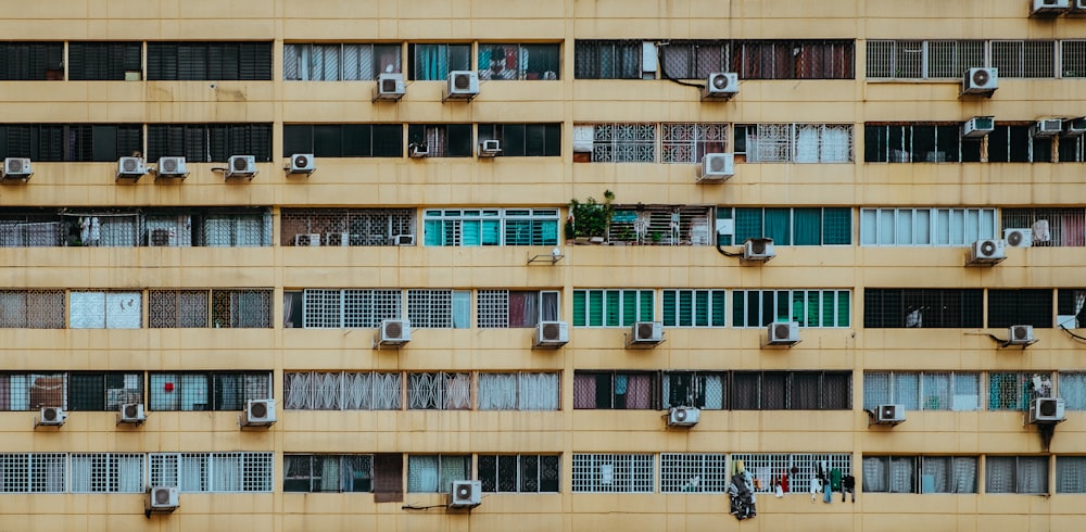 white home appliance hanging by building